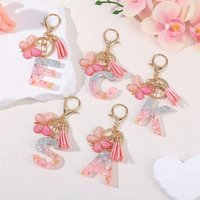 Pink Letter Keychain, a Keychain Featuring Sequins and Bow Pendant, Suitable for Hanging on a Bag, Suitable for Car Keys and Women's Wallets.