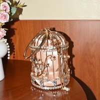 Metal hollow birdcage bag, shiny and inflexible, rhinestone-studded flowers, high-end portable dinner bag