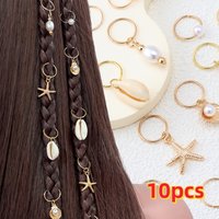 10 pieces · Bohemian beach style hair accessory set. Sea star, shell and pearl hair rings. Y2K style women's hair accessories.
