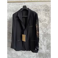 TOP-YAMAMOTO velvet hand-held printed suits at the Paris show