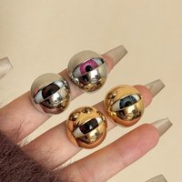 New round ball hollow eye ring