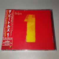 CD '1' Is A Greatest Hits Album By The Beatles and Is Also One of The World's Most Commercially Influential Compilation Albums.