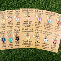 A gift for you/He 14Five colorful donuts Cute cat keychain set that brings good luck Round and rolling cat donut-shaped soft toy