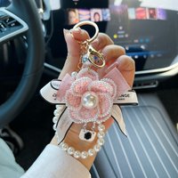 Creative Camellia Bow Bag Pendant Keychain Fashion Pearl Chain Korean Car Keychain Women's Circle