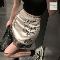 French lace graffiti skirt women's summer A-line skirt is thin and slim, with a drooping satin design and a splicing skirt.