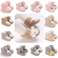 Bottes d'automne et d'hiver pour bébés filles et garçons, chaussures chaudes, solides, à la mode, boules pelucheuses, premiers pas, chaussures pour enfants de 0 à 18 mois