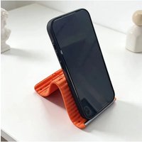 Foldable silicone phone holder, compatible with iPhone, iPad, tablet and laptop, is an ideal choice for office desks and travel