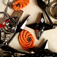 20 Styles Bandai Naruto Red Cloud Alloy Keychain Set Woven Leather Rope Charm Cartoon Keychain Car Pendant Young Punk Toy Gift
