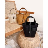 2026 New Canvas Patchwork Bucket Bag Vegetable Basket Handbag Swift Leather Women's Commuter Bag Single Shoulder Lock Buckle