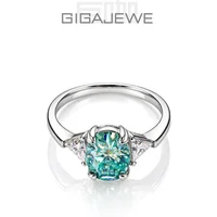 GIGAJEWE Cyan 2.0CT Oval Cut Moissanite Ring with Triangle Side Stones 925 Sterling Silver 18K White Gold Plated