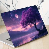 Set of two light beige vinyl stickers for laptops, designed to be scratch resistant and can be used as a protective cover