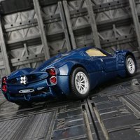 CCA 1:32 Pagani alloy car model ornament collection, doors and trunk can be opened has simulated sound and lighting functions