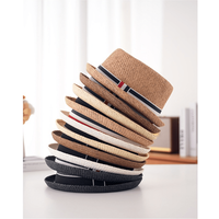A top hat with a black woven ribbon and a short brimmed straw woven breathable sun shading jazz hat in British style