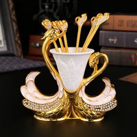 A swan shaped fruit fork and spoon set, a bucket rack 6 spoons or forks, suitable for drinking coffee, eating dessert, fruit use
