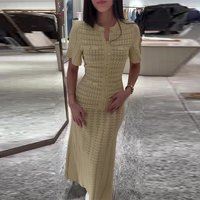 2026 Spring New Fashion Beige Temperament Knit Long Dress Women Elegant O-neck Hollow-out Short Sleeve Slim Robe Ladies