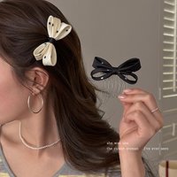Sweet polka dot bow upside-down comb hair clip for women with high crown