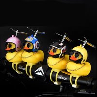 AliExpress NONE 2023 Car Interior Broken Wind Small Yellow Duck with Helmet Airscrew Cute Wind-breaking Duck Cycling Decoration Ornament