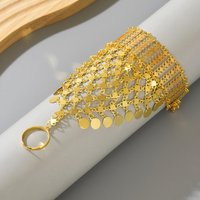 A Retro Ethnic Style Metal-Gilded Hollow-Carved Round Pendant Tassel Personalized Design Finger Chain