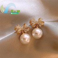 Butterfly Knot Stud Earrings Lustrous Pearl Drops Exquisite Light Luxury Jewelry Trendy Elegant Versatile For Women 2025 Hot Sel