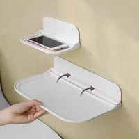 Nowa składana półka ścienna bez dziurkacza naścienna plastikowa pływająca półka gospodarstwa domowego łazienka toaleta ręcznik stojak do przechowywania ubrań