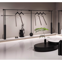 Wall mounted clothes hangers in women's clothing stores and display shelves in clothing stores