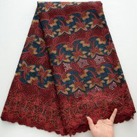 Rich Red African Swiss Cotton Lace Fabric with Multicolor Floral Patterns, Gold Blue Embellishments & Stones For Wedding & Party