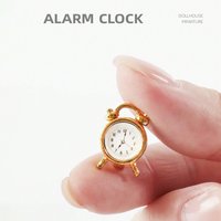 1 piece of dollhouse miniature metal alarm clock: 1/12 mini simulation bedroom scene decoration model (sticker random)
