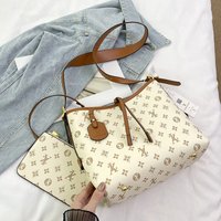 Women's fashionable retro large capacity mother-and-daughter travel bag. Classic and versatile soft leather tote bag suitable fo