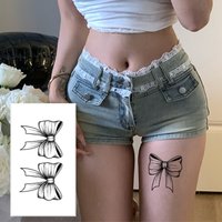 French Ribbon Bow Tattoo Sticker: herbal juice sensual design for neck scar cover. Vivid semi-permanent realistic art.