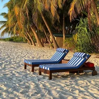 A Foldable Outdoor Garden and Beach Chair with Waterproof Pool Lounge Cushion Rectangle Quilted Hotel Bed Pillow for Beach Pool