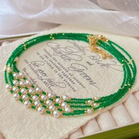 Vintage high-quality artificial green cat's eye stone and Swarovski round high-luster pearl collarbone necklace