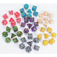 A set of 7 polyhedral dinosaur dice with skull symbols and golden fingerprints, used as table dice for role-playing games