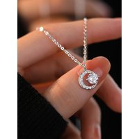 A 925 silver 0.5 carat moissanite sparkling crescent necklace. Moon niche design moissanite necklace