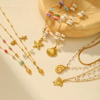 Summer Bohe Starfish Shell Conch Charms Pendant Neccklace for Women, 18k PVD Gold Plated Stainless Steel Beach Holiday Gift