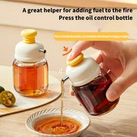 A Quantitative Squeeze Oil Bottle Available in Green Or White, a Glass Soy Sauce And Vinegar Dispenser for The Kitchen