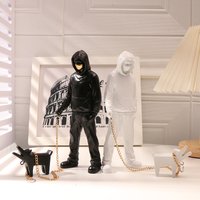 Creative Banksy Is A Fashionable Man Who Plays with Dogs, White Fashionable Toys, Art Sculptures, and Decorations