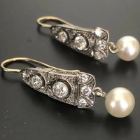 Luxury Court Style Copper Pendant Earrings with Millet Bead Patterns & Artificial Gemstones, Ideal for Parties and Gatherings.