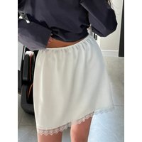 Bornladies Women's Fashion Silk Satin Mini Skirt 2026 New Lace Bottom Design Sense Short Skirt Suitable for Daily Casual Wearing
