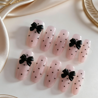 10 pieces of hand-pressed oval nails, beautiful fake nails, with pinkish-white polka dots and bowknots, suitable for women
