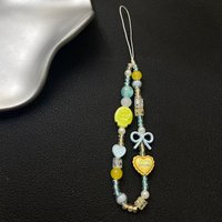 One piece macaron color phone charm, fresh yellow & blue beaded strap with heart and bow ornaments. Suitable for phone, handbag