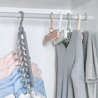 Multi functional nine hole clothes hanger, foldable magic clothes hanger, space saving bedroom storage artifact