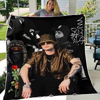 Peso Pluma Cobija Blanket Thrown On Soft And Cozy Roses Fleece Blanket
