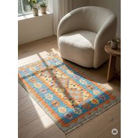 Kelim Gashgai Orange „Rugtales“ aus Schurwolle, 84x131 cm