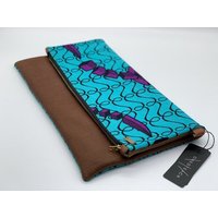 ONE OF EACH Clutch "Nigeria" Handtasche aus Leder und Baumwollstoff mit afrikanischem Print