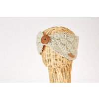 short'n'pietz Schurwollstirnband mit Schachbrettmuster und Holzknopf, handgestrickt
