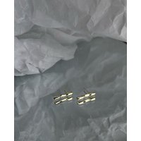 noemvri fashion label twisted Ohrstecker Hugo