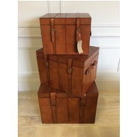 Click to view product details and reviews for Set Of 3 Brown Leather Trunks. Click to view product details and reviews for Set Of 3 Brown Leather Trunks.
