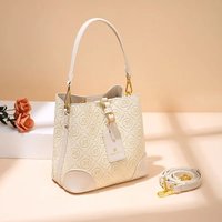 Large Capacity Embossed Faux Leather Bucket Bag with Retro Print