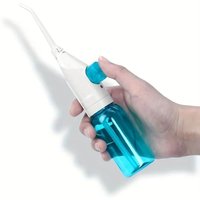 Portable Manual Oral Irrigator Water Flosser