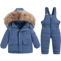 Winterliche Kinderjacke mit Weste und kuscheligem Fellkragen in blau - 2T